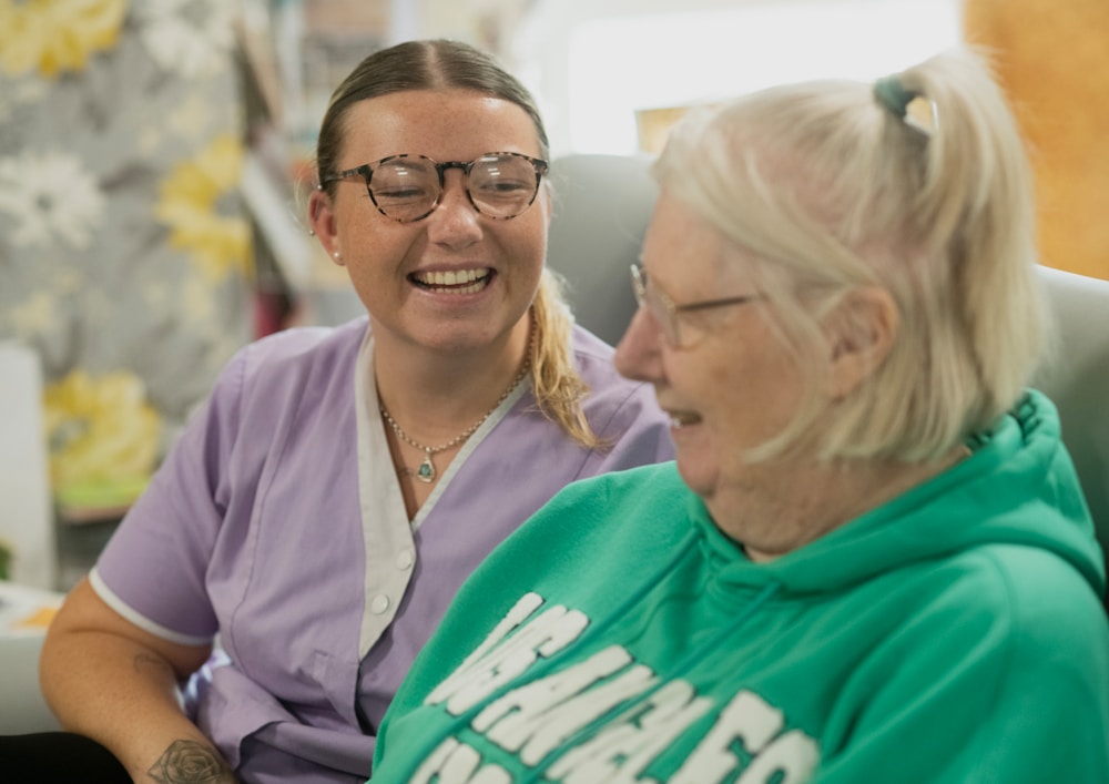 A warm care interaction between two people
